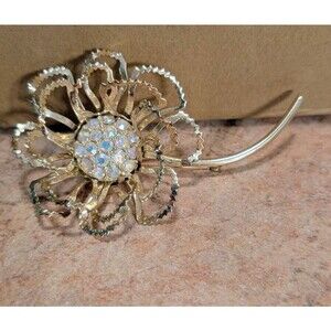 Sarah Coventry Allusion Gold Tone Floral Design With Aurora Borealis Center 1968